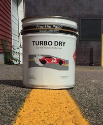 5 gallon pail of solvent borne striping paint. Brand name is Turbo dry from Franklin paint